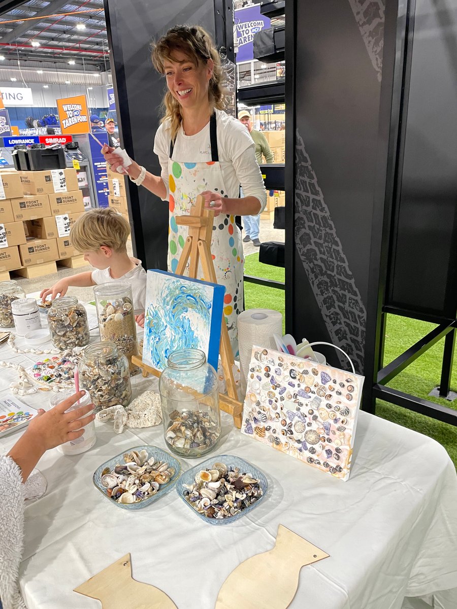 Kids crafting at the PLAYCARNIVAL activation table inside BCF Taren Point
